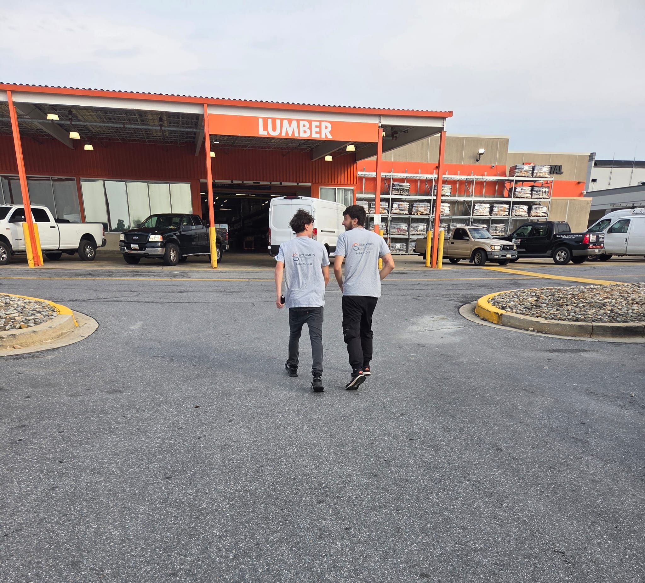 Solomon crew members heading into a lumber yard