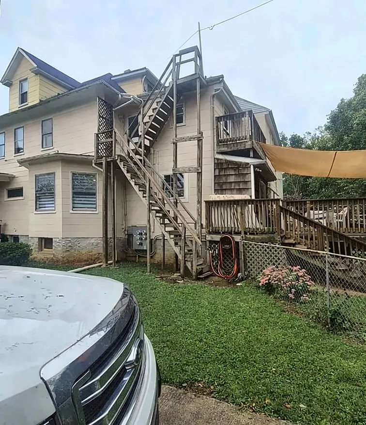 Before: Before and after of rebuilt multi-story exterior stairs